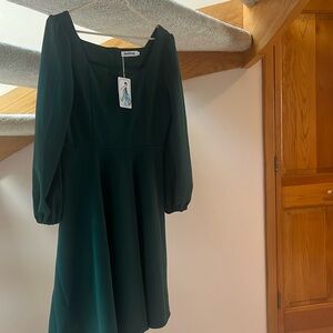 Dark green dress from Jusfitsu. Size medium. New with tags